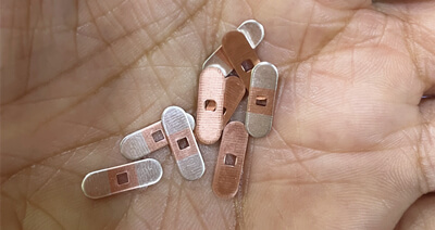 Livrare pentru ștanțare realizată cu bandă de incrustație argintie